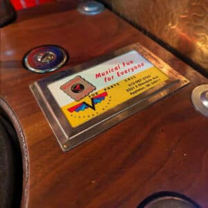 1964 Wurlitzer 1015 restored and the service card attached.