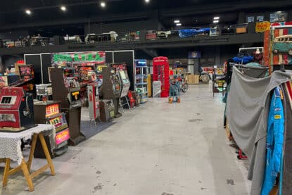 Rock Around the Jukebox Show vintage casino items and old phone booth in distance.