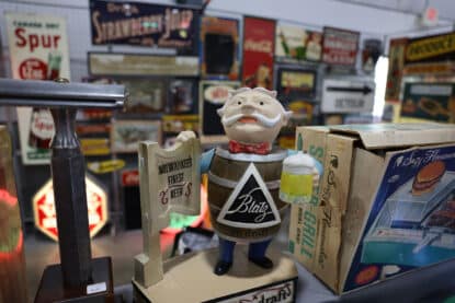Vintage Blatz Beer barrel mascot advertising figure holding a stein, labeled "Milwaukee’s Finest Beer," displayed at the Chicagoland Coin-Op Show.