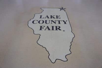 Lake County Illinois fairgrounds building entrance floor logo.