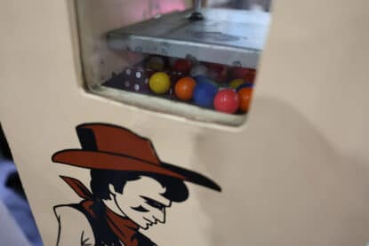 Silver Dollar Saloon skill game with Wild West graphics close-up of cowboy graphic.