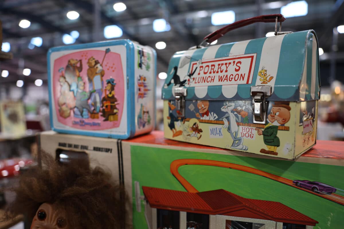 Vintage lunch boxes including Porky's Lunch Wagon.