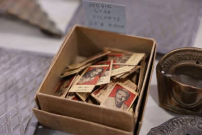 Box of vintage 1950s movie star collector tickets featuring classic Hollywood celebrity portraits.