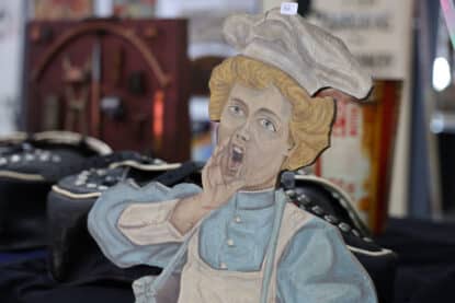Hand-painted wooden cutout of a surprised chef, likely vintage signage or carnival display piece, priced at $850.