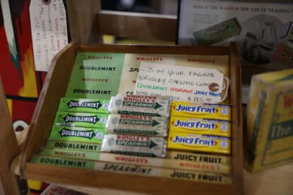 Vintage Wrigley’s chewing gum display featuring Doublemint, Spearmint, and Juicy Fruit packs with original packaging at the Chicagoland Coin-Op Show.